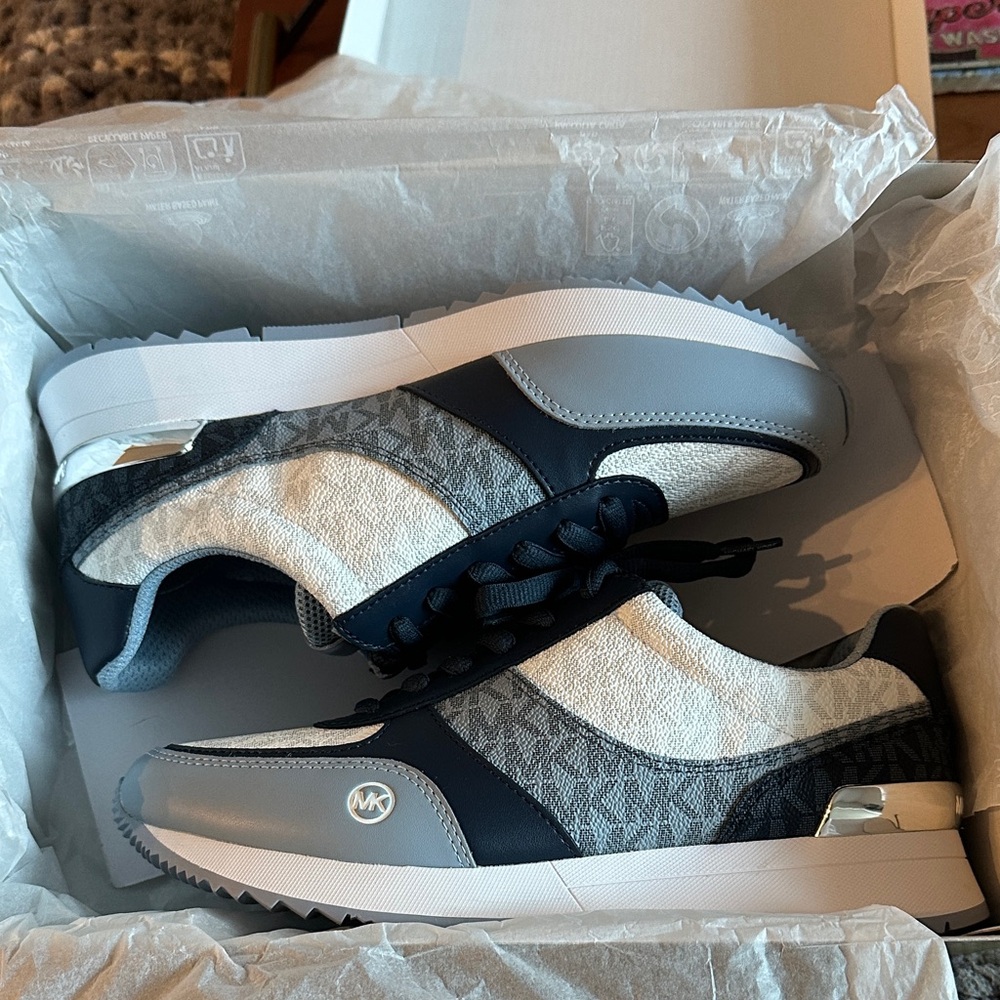 Woman’s Blue and White Michael Kors Sneakers